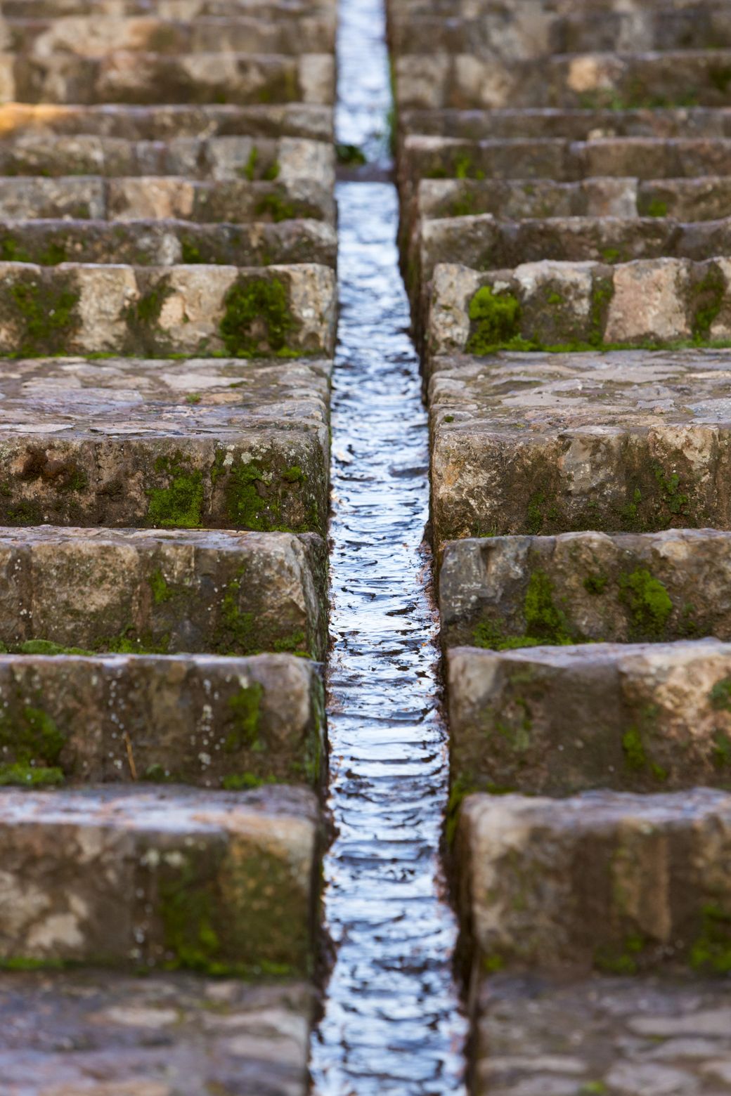 An Inca water channel running through the stonework at Chinchero