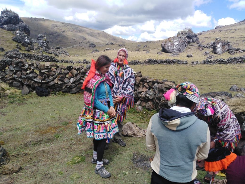 An offering to the Pachamama with the community